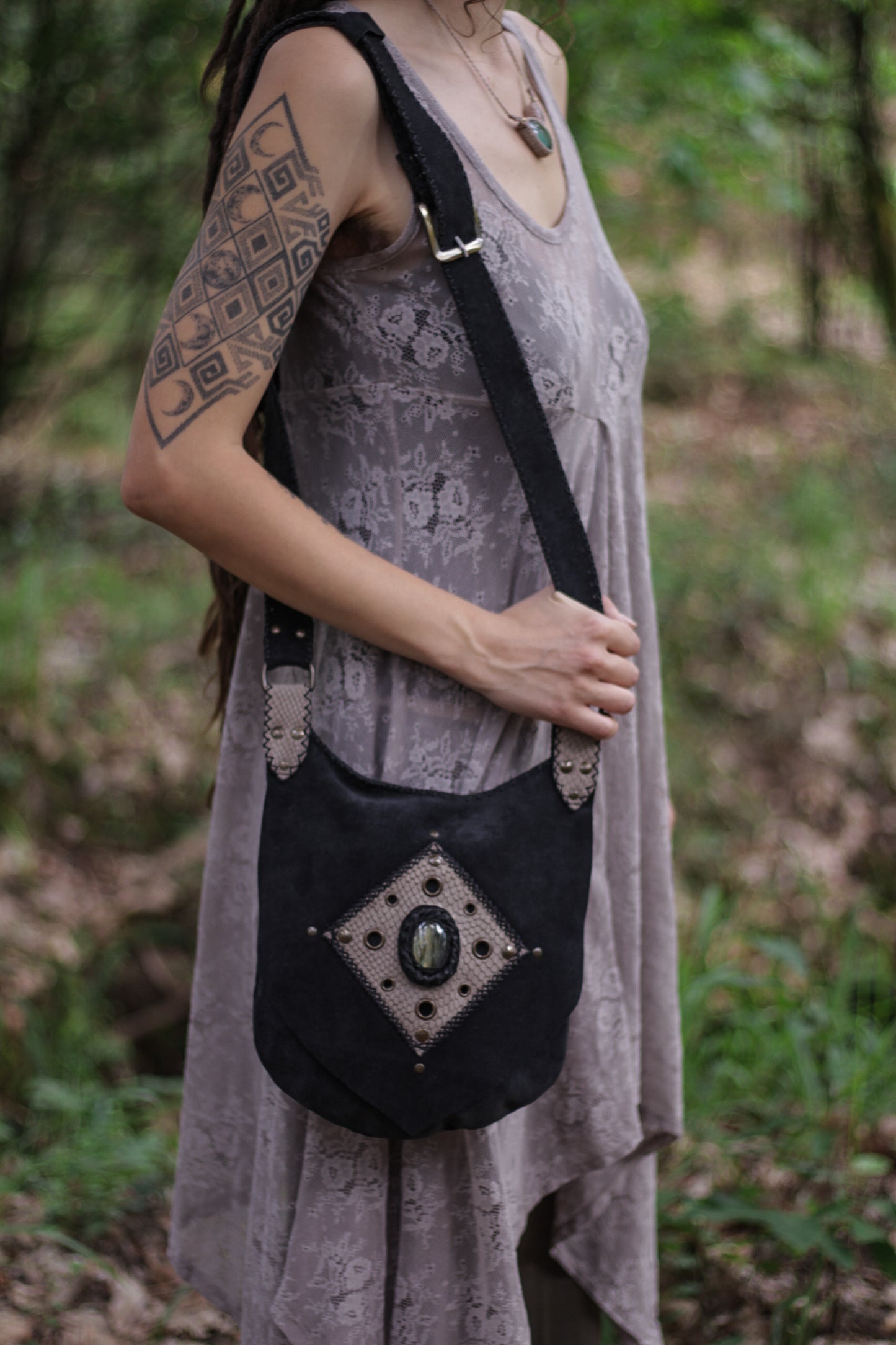 Black suede bag with labradorite