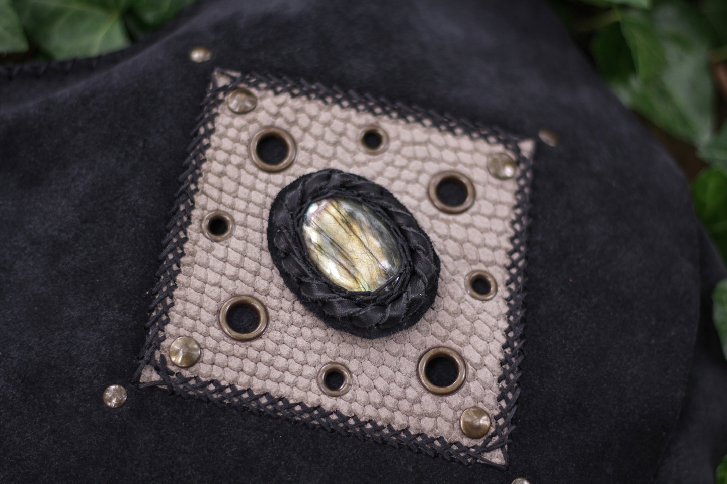 Black suede bag with labradorite